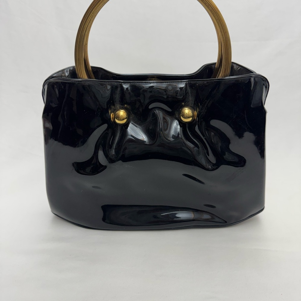 Elegant Black Handbag with Gold Accents